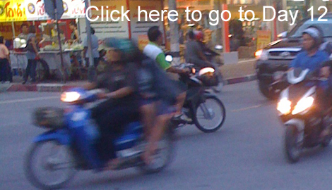 Motorbikes streaming by in Bangkok