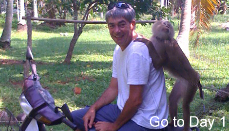 neale on a motorbike with a monkey