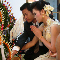 Thai Couple making Wai greeting
